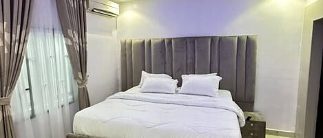 1 غرفة نوم ومكواة/لوح كي وواي فاي وملاءات أسرّة