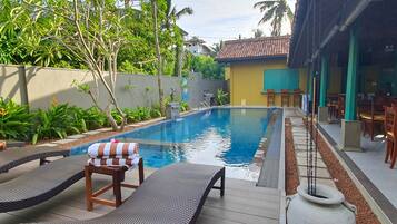 Outdoor pool, sun loungers