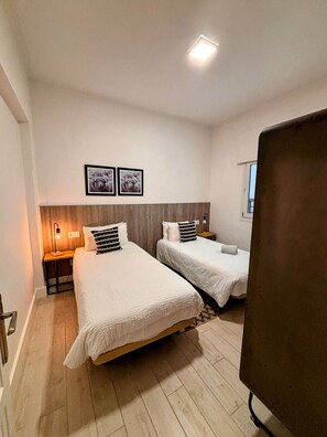 2 bedrooms, desk, iron/ironing board, travel crib