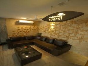 Room, Multiple Bedrooms, Garden View | Living room - Room-la Riviera Suites Madhapur (Hyderabad)