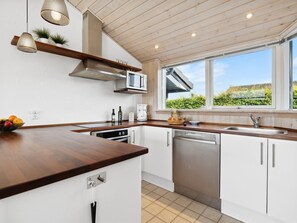 Fridge, microwave, dishwasher, cookware/dishes/utensils