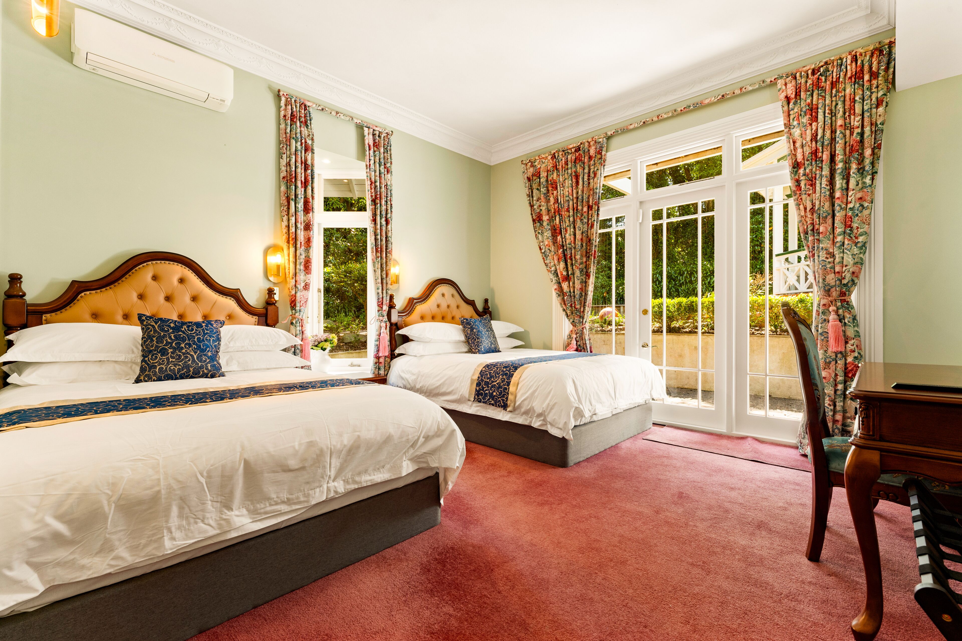 Family Quadruple Room | Minibar, in-room safe, individually decorated, individually furnished