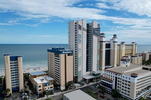 Stunning ocean views surround the Courtyard by Marriott complex, featuring modern architecture and a beachside location.