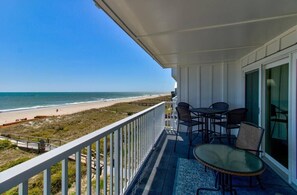 Outdoor dining - Carolina Surf: 3BR Condo w/ Stunning Ocean Views (Carolina Beach)