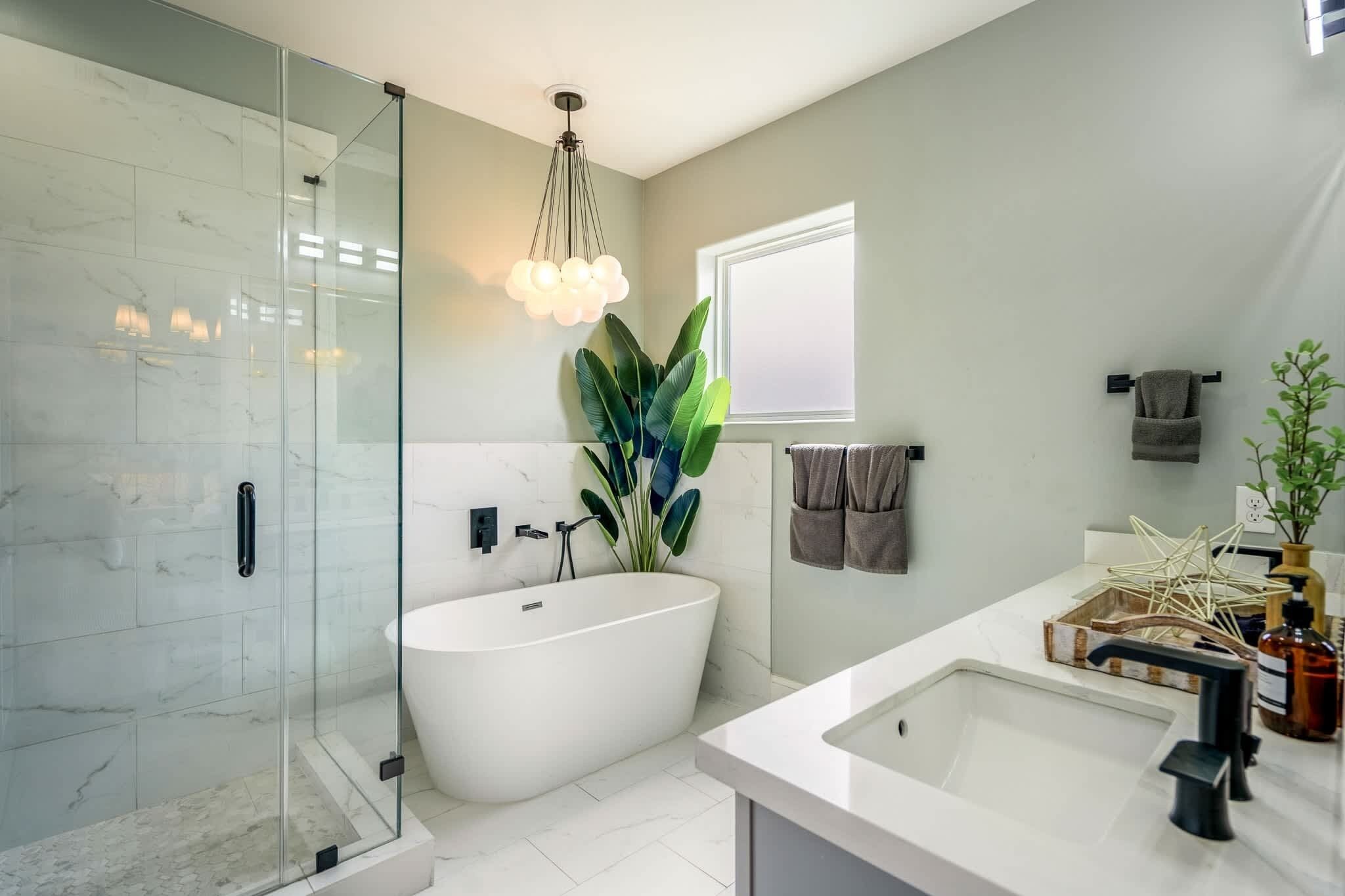 Shower, hair dryer, towels, shampoo