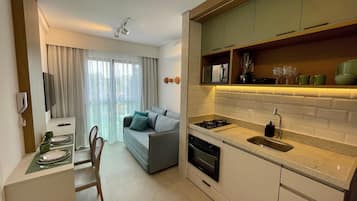 Apartamento | Área de estar | TV