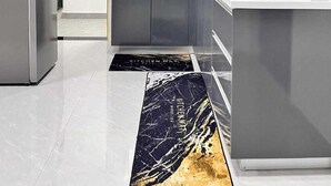 A modern kitchen with a stainless steel refrigerator, a sink, and a stove. - Lux Suites Gold Park Apartments Kilimani (Nairobi)