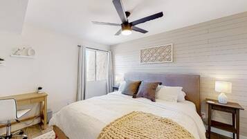 1 bedroom, desk, laptop workspace, iron/ironing board