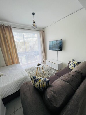 Deluxe Apartment | Living area - Racecourse Radiance Apartments (Nairobi)