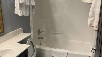 Traditional Double Room, 2 Queen Beds | Bathroom | Combined shower/tub, rainfall showerhead, towels, soap