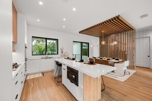 Fridge, microwave, oven, stovetop - Brand New home with Incredible Rooftop Deck and Pool! - Just Breathe (Anna Maria)