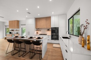 Fridge, microwave, oven, stovetop - Brand New home with Incredible Rooftop Deck and Pool! - Just Breathe (Anna Maria)