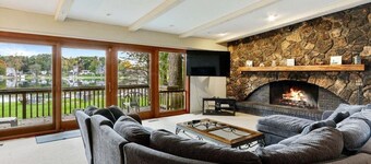 The Lake House on Powers |Grassy Frontage |Lakeside Deck |Rec Room w/Pool Table & Bar |Fire Pit