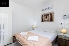 Desk, iron/ironing board, travel cot, free WiFi