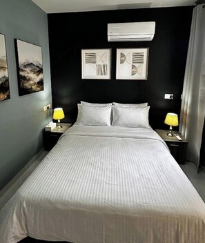 Desk, iron/ironing board, travel crib, free WiFi