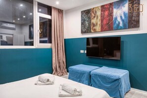 1 bedroom, desk, iron/ironing board, travel cot