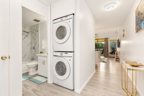 Shower, hair dryer, towels