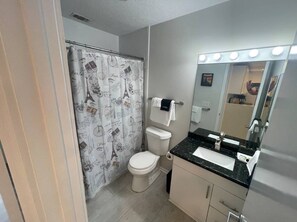 Eco-friendly toiletries, hair dryer, towels, soap