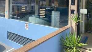 A building with a sign reading "ACQUA FLATS RESIDENCE". - Acqua Flats Residence  (Jaguariuna)