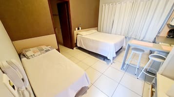 Superior Triple Room | Blackout drapes, iron/ironing board, free WiFi, bed sheets