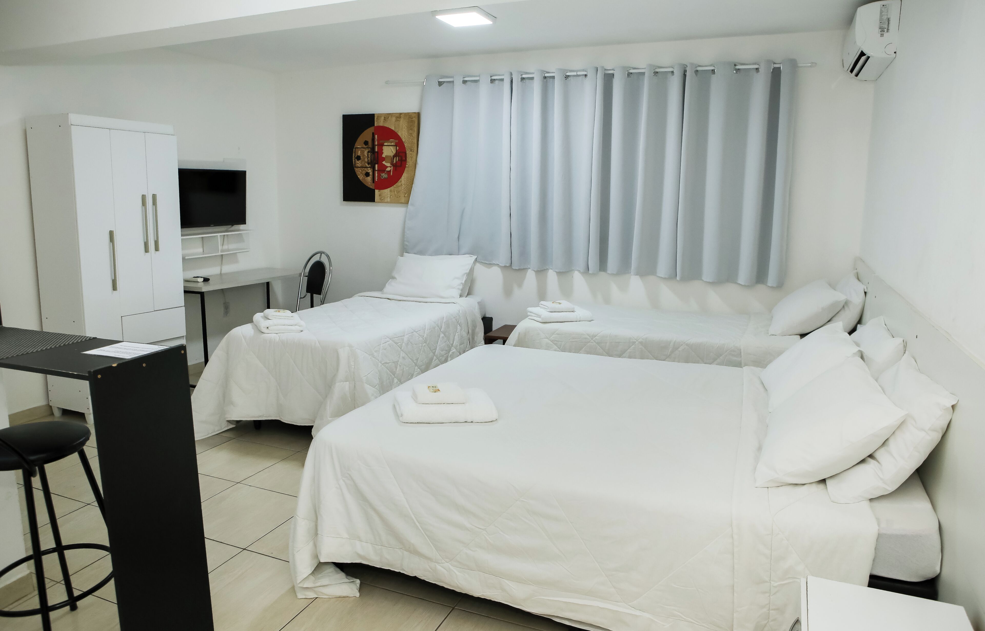 Family Quadruple Room | Blackout drapes, iron/ironing board, free WiFi, bed sheets