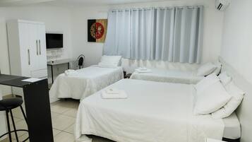 Quarto quádruplo família | Cortinas blackout, ferros/tábuas de passar roupa, Wi-Fi de cortesia