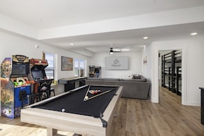 Games room - New 7 bdrm home (sleeps 28) w/ amazing lake views, hot tub, fire pit, playground (HOLLISTER)