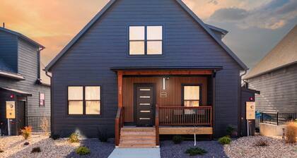 Themed new 7 bdrm home w/ lake views, hot tub, fireplace, fire pit, & game room