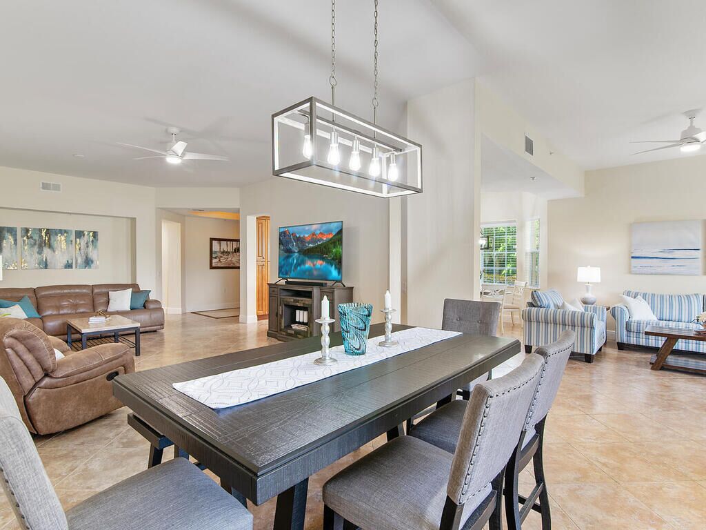 Fiddler's Creek first floor coach home. 3 bed /3 bath. Bright open floor plan.