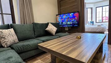 Appartement, 1 chambre, accessible aux personnes à mobilité réduite, fumeur | Coin séjour