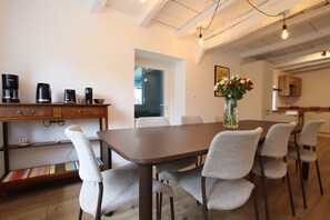 Enjoy meals in this dining area with a rectangular table and six comfortable chairs.