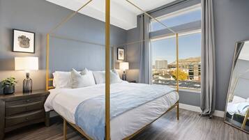 1 bedroom, desk, iron/ironing board, travel crib