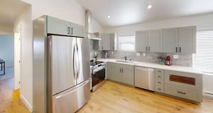 NEW Listing! NEW Build! Condo is 1-block walk to restaurants, shopping, concerts