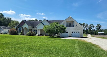 Expansive haven nestled in a serene country setting!
