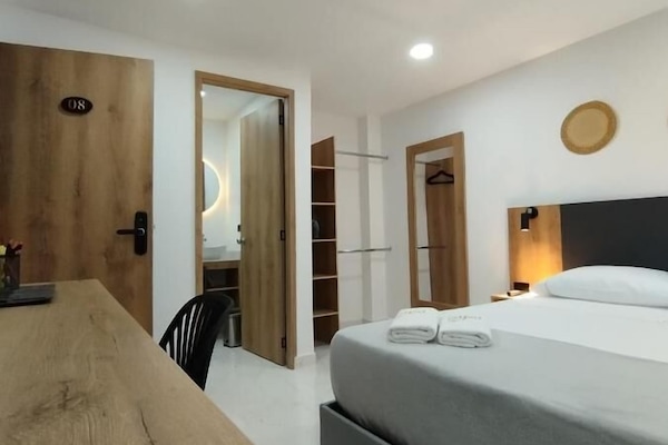 Deluxe Double Room | Premium bedding, in-room safe, desk, laptop workspace