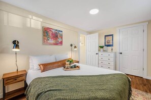 1 bedroom, desk, iron/ironing board, travel crib