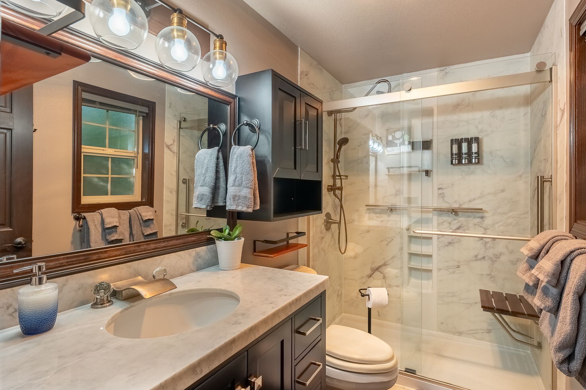 Hair dryer, towels, soap, shampoo