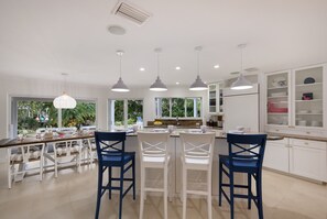 Fridge, microwave, oven, stovetop - Canal Walk: Tiki Bar, Mini Golf, Pool & Spa On Canal by Anna Maria Life Vacation Rentals (Anna Maria)