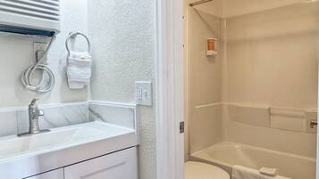 Hair dryer, towels, soap, shampoo