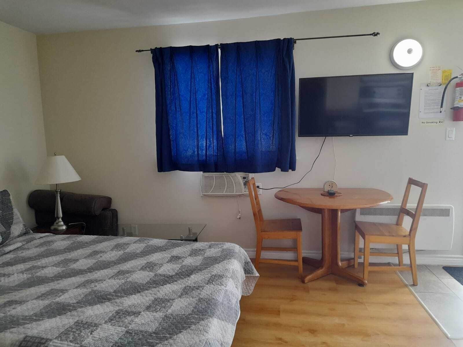 Desk, laptop workspace, blackout curtains, soundproofing