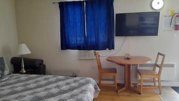 Desk, laptop workspace, blackout curtains, soundproofing