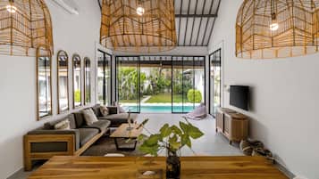Deluxe Villa, 3 Bedrooms, Private Pool, Garden View | Living area | 32-inch Smart TV with digital channels