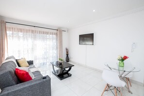 TV - The cottage is your home away from home. Nestled in the heart of Fourways. (Sandton)