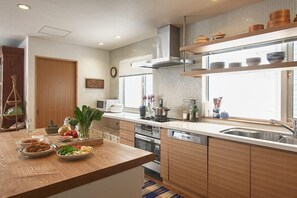 Family Chalet | Private kitchen | Full-size fridge, microwave, stovetop, dishwasher