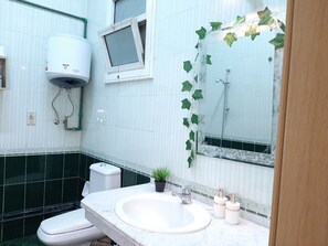 Deluxe-huoneisto | Kylpyhuoneen pesuallas