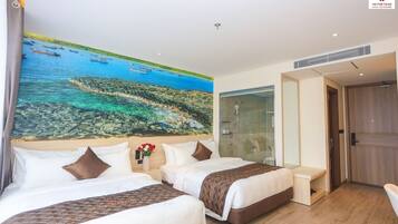 Family Twin Room | Minibar, in-room safe, laptop workspace, free WiFi