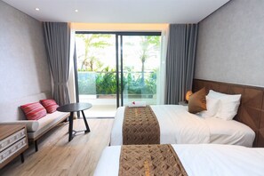 Family Twin Room | Minibar, in-room safe, laptop workspace, free WiFi