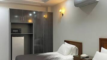 Habitación triple | Tabla de planchar con plancha y wifi gratis