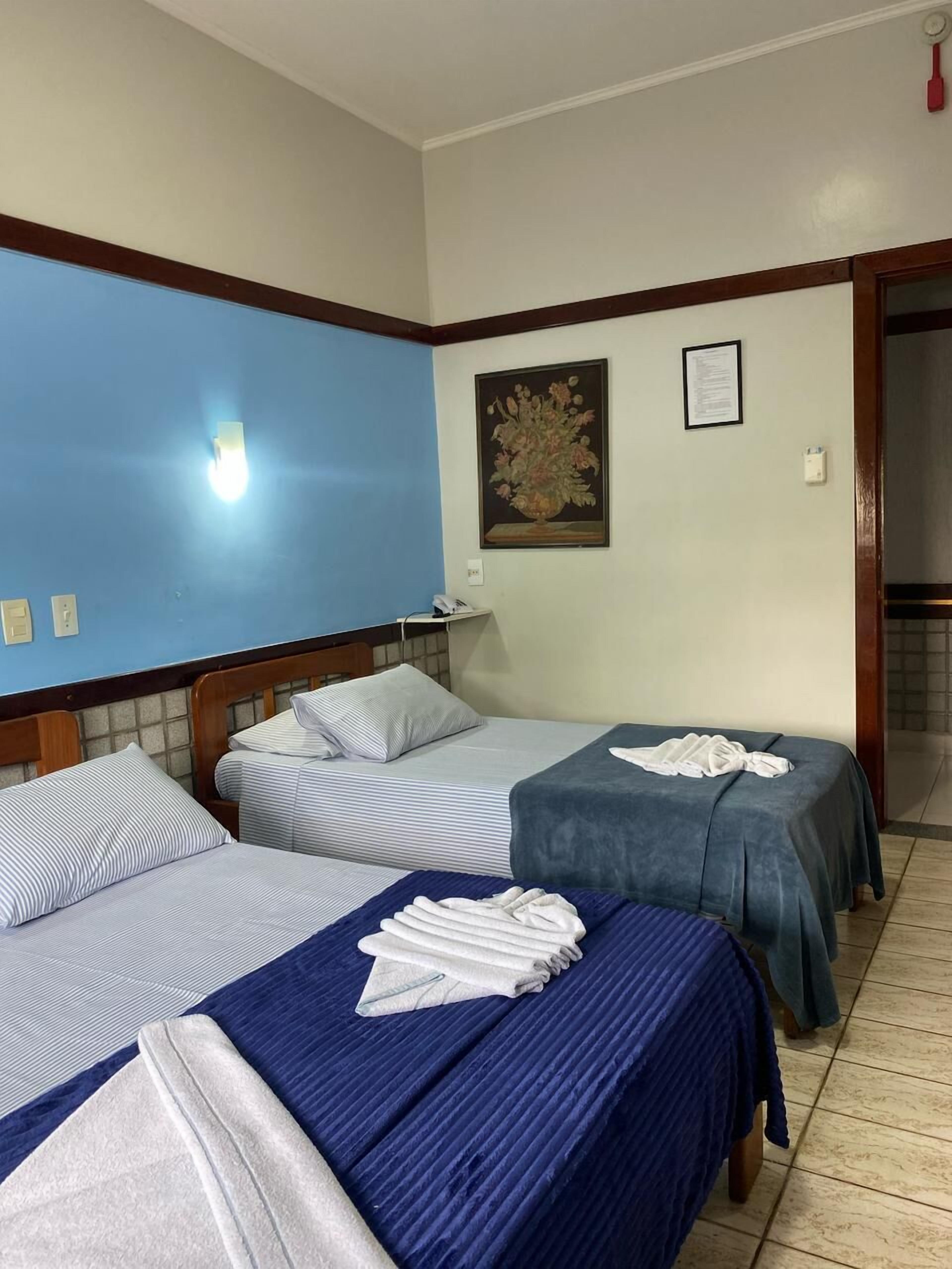 Standard Triple Room, City View | Minibar, free WiFi, bed sheets