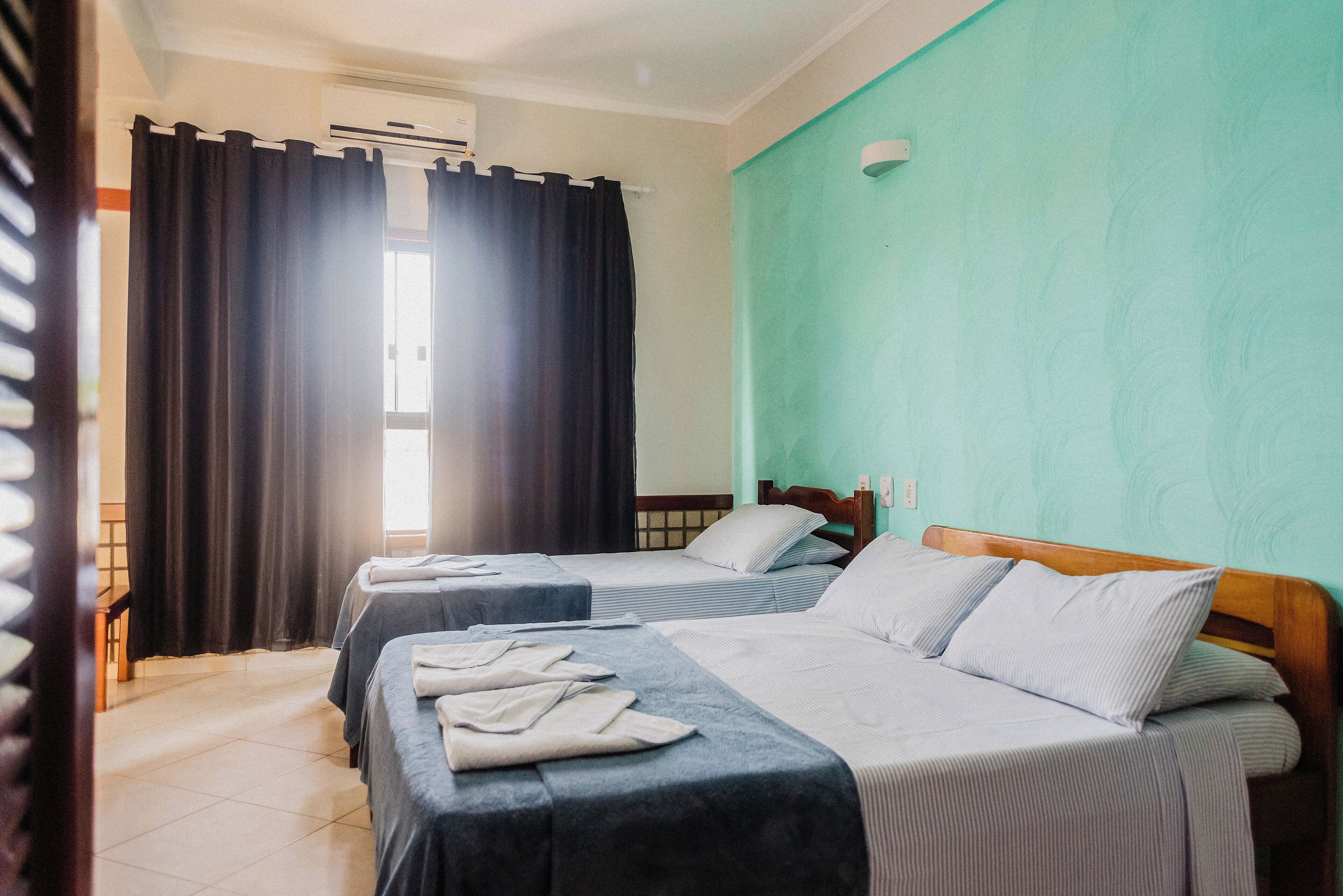 Classic Triple Room, 1 Bedroom | Minibar, free WiFi, bed sheets